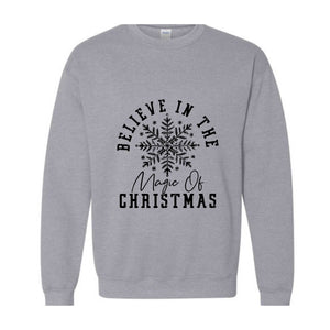 Believe In The Magic of Christmas Sweatshirt, Holiday Sweatshirt, Magical Xmas Sweatshirt, Festive Quote Sweatshirt