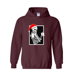 Skeleton With A Gift Christmas Sweatshirt, Merry Christmas Sweatshirt, Holiday Season, Spooky Santa Surprises Sweatshirt