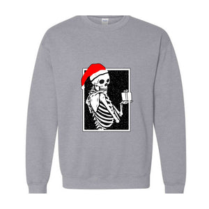 Skeleton With A Gift Christmas Sweatshirt, Merry Christmas Sweatshirt, Holiday Season, Spooky Santa Surprises Sweatshirt