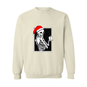 Skeleton With A Gift Christmas Sweatshirt, Merry Christmas Sweatshirt, Holiday Season, Spooky Santa Surprises Sweatshirt